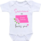Daiichiban Designs Someone in North Dakota loves me baby clothes Custom baby gifts
