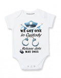 Daiichiban Designs Police Pregnancy Announcement Baby Bodysuit – “We Got One in Custody” with Custom Date