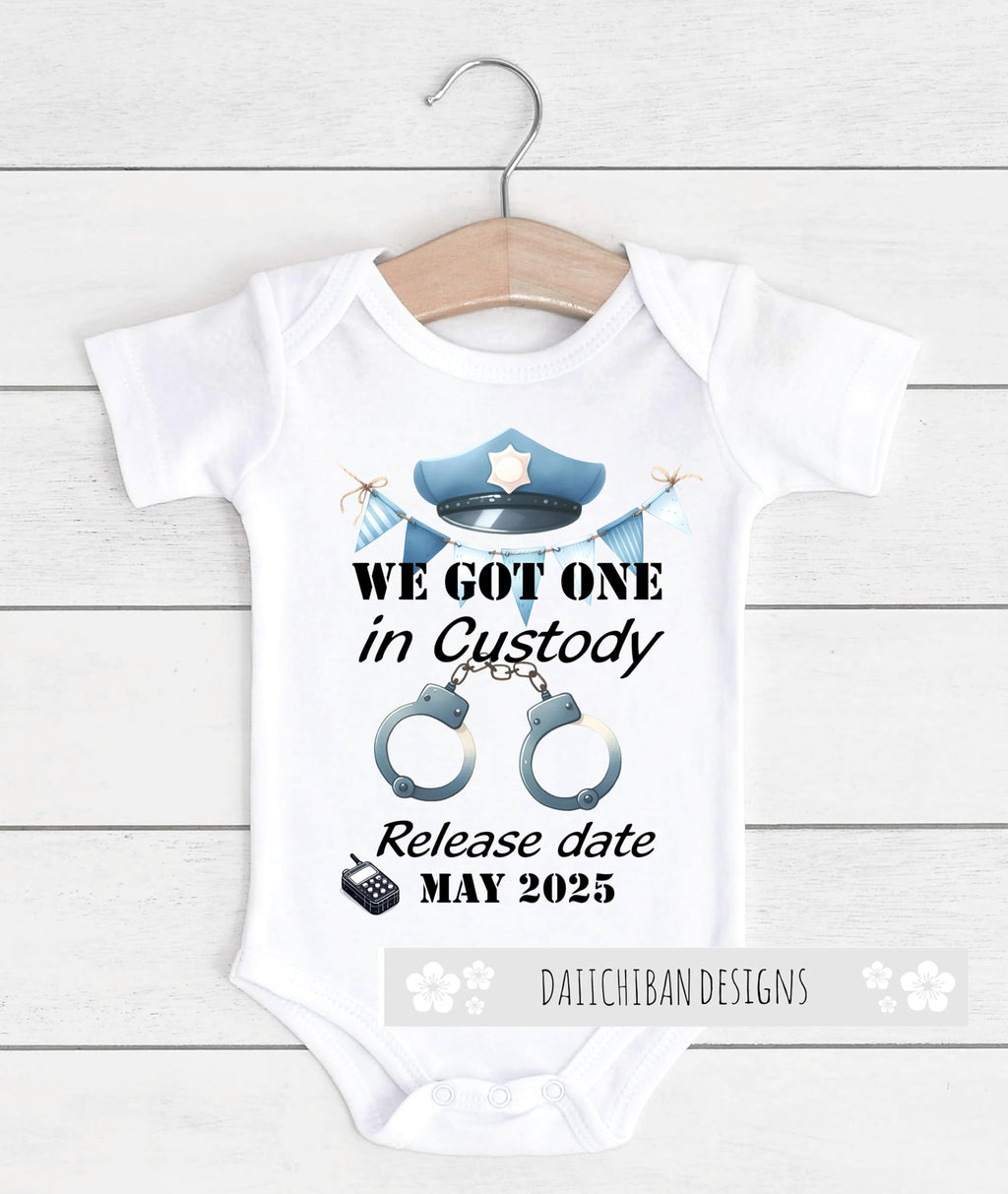 Daiichiban Designs Police Pregnancy Announcement Baby Bodysuit – “We Got One in Custody” with Custom Date