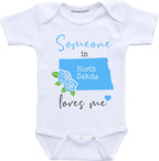 Daiichiban Designs Someone in North Dakota loves me baby clothes Custom baby gifts